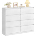 Das Sideboard zeigt grifflose Fronten in Weiss